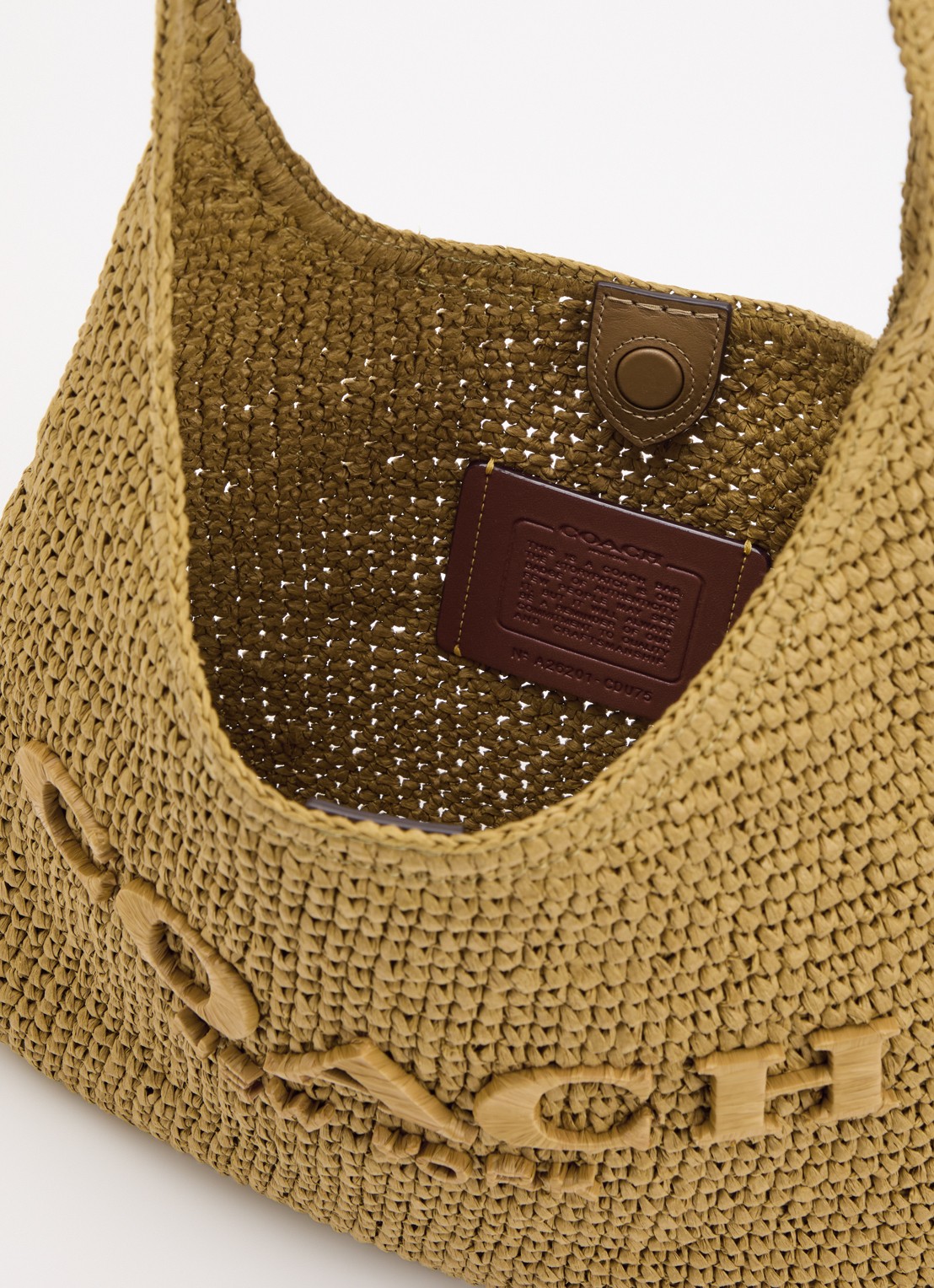 Coach Brooklyn 28 schoudertas van stro met logo  - detail olijfgroen
