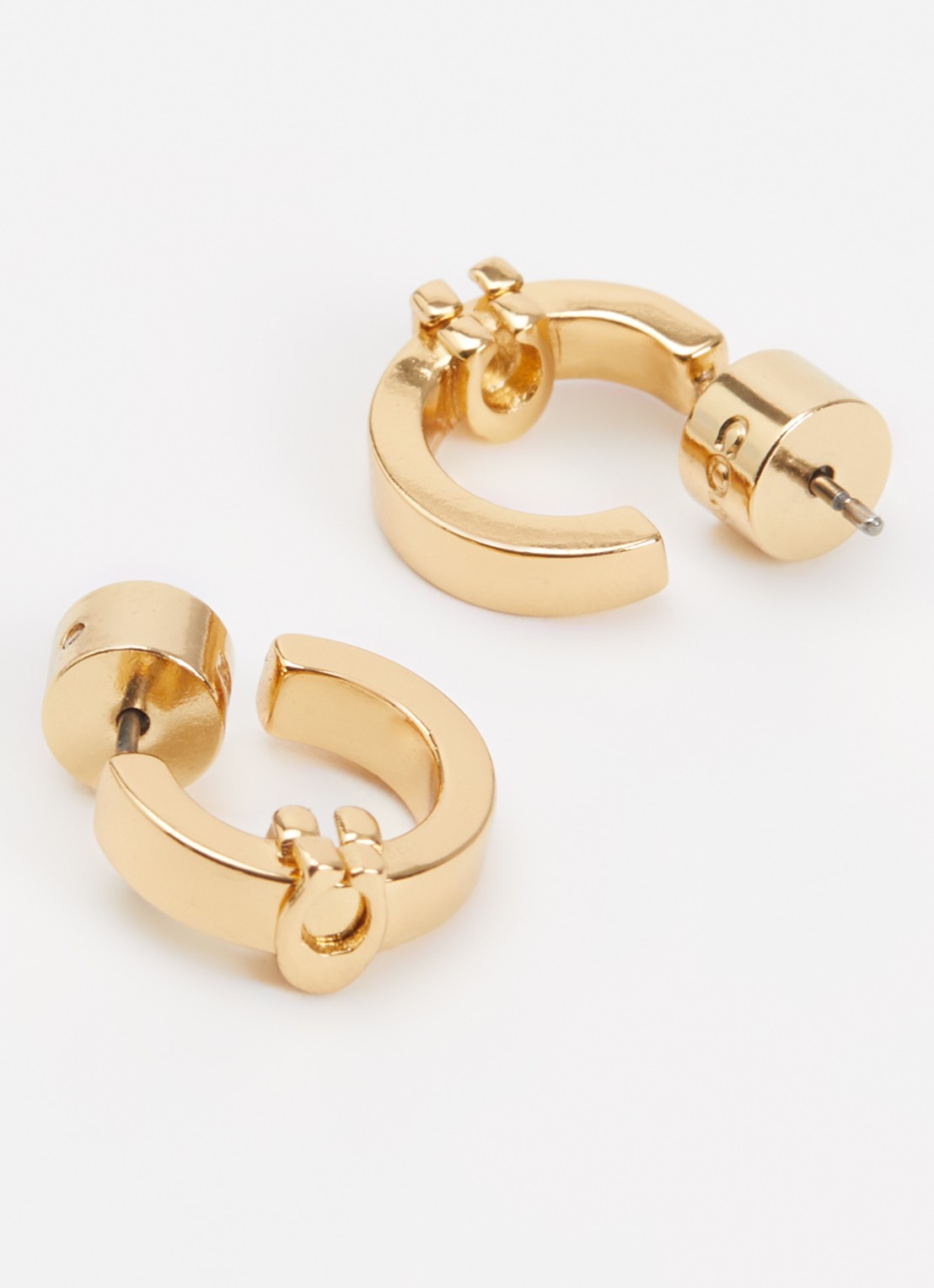 Coach C Huggie oorringen - detail goud