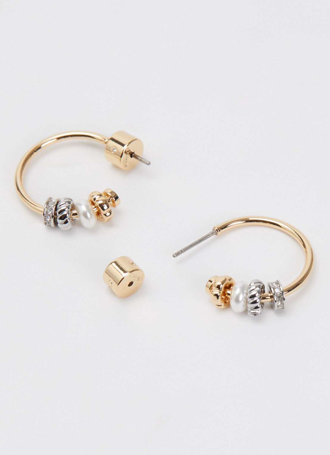 Coach Rondelle oorstekers met kristal - detail goud