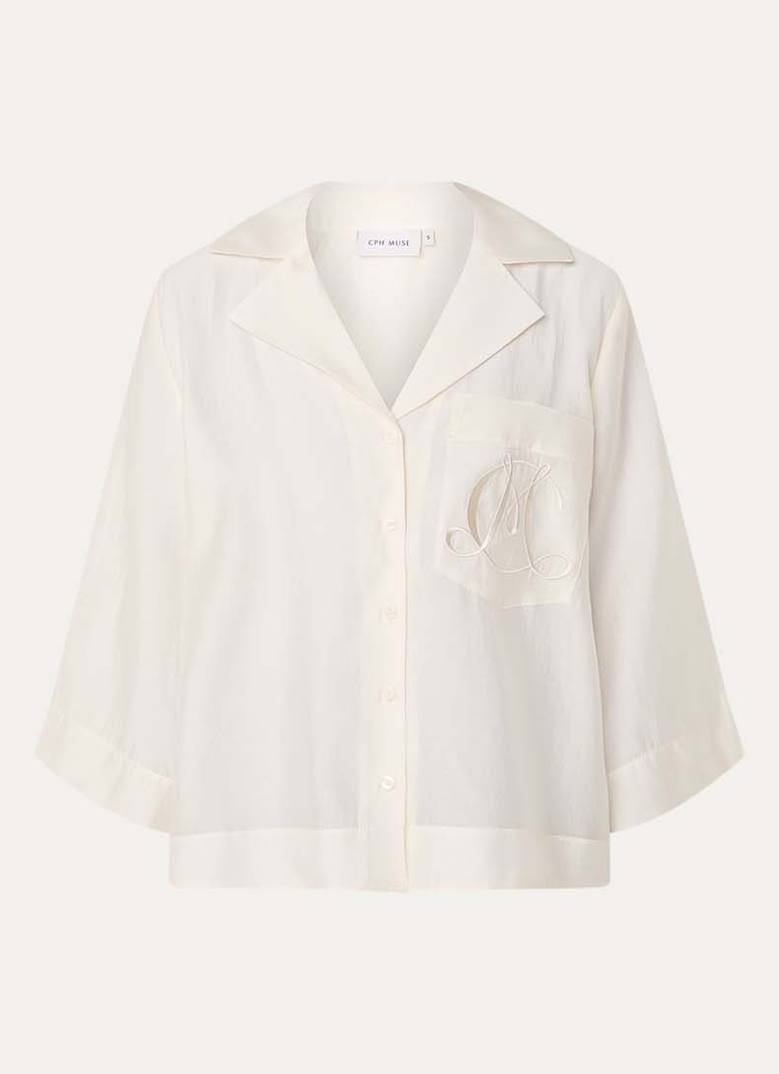 Copenhagen Muse Molly semi-transparante blouse met borstzak en logoborduring - voorkant creme