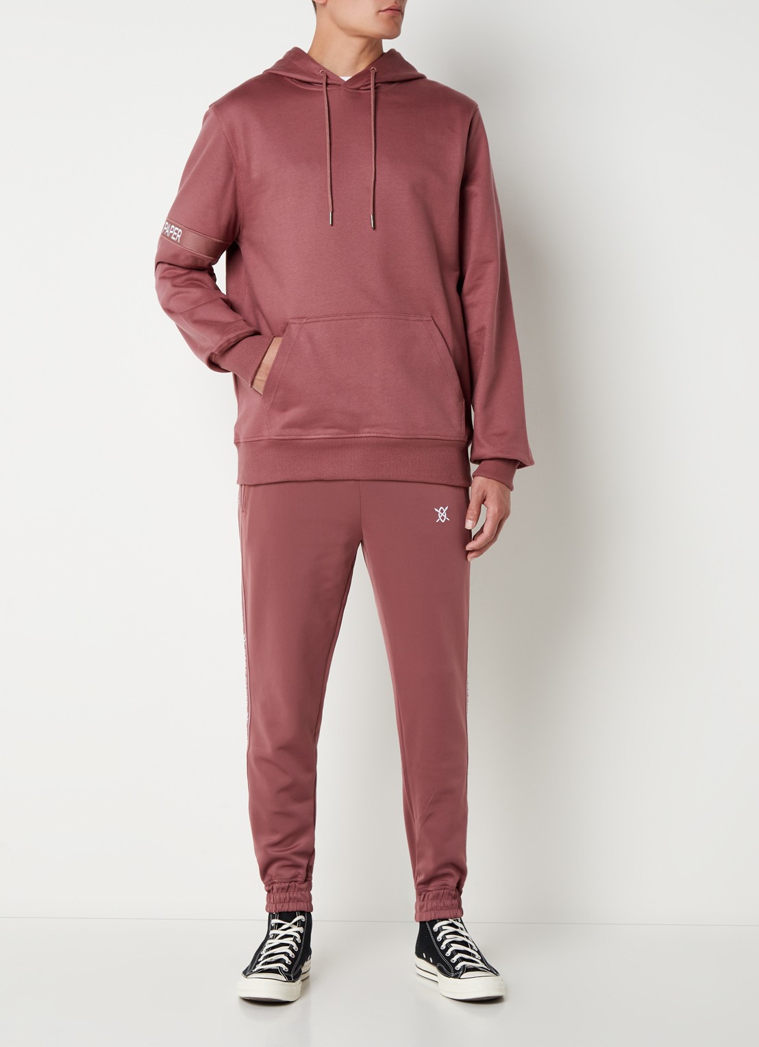 Daily Paper Etape tapered fit cropped trackpants met ritszakken en logoband - voorkant 2 roodbruin