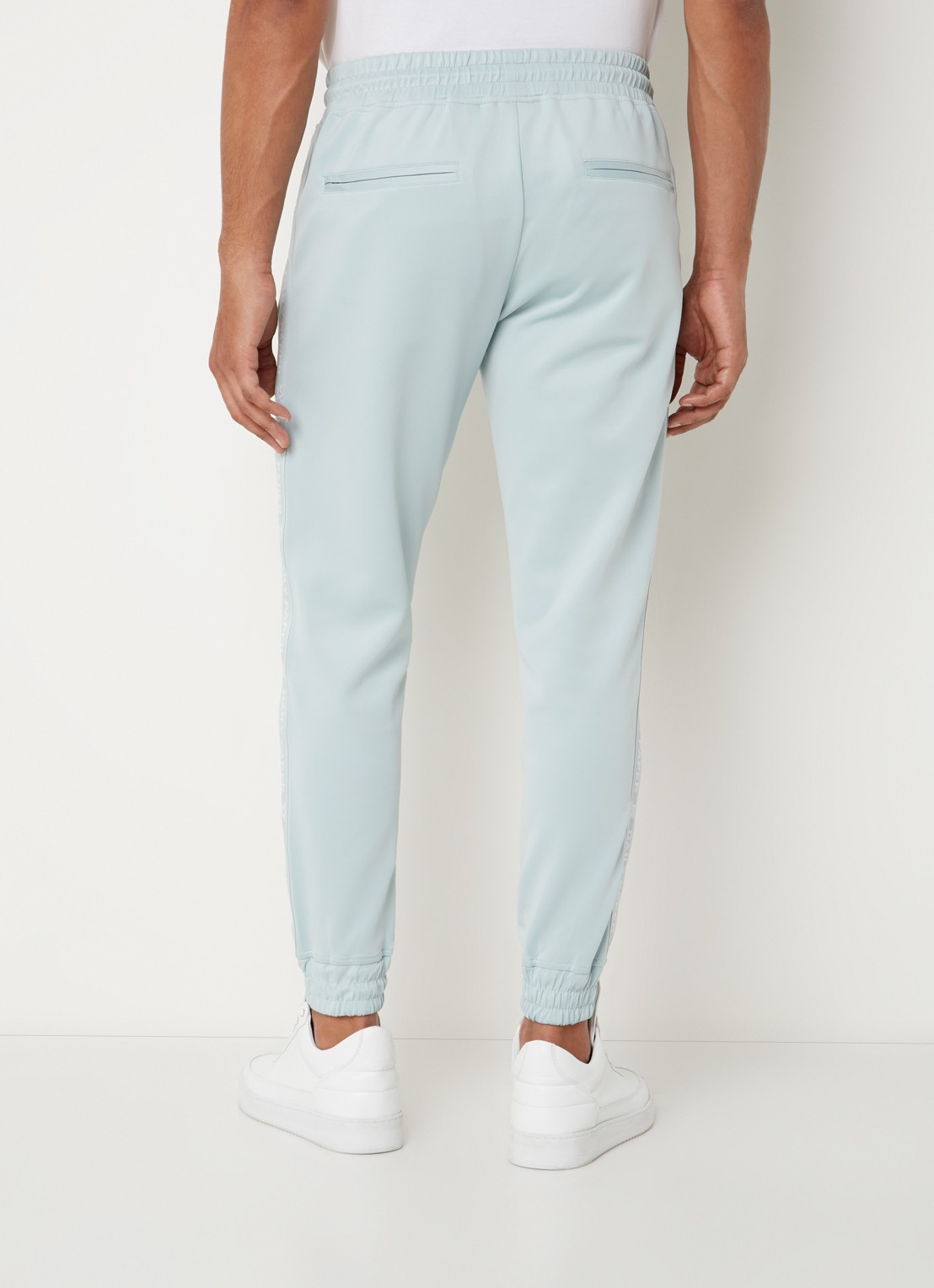 Daily Paper Etape tapered fit cropped trackpants met ritszakken en logoband - achterkant 5 mint