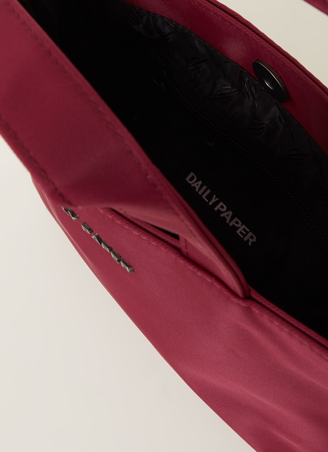 Daily Paper Etiny handtas met afneembare schouderriem - detail aubergine