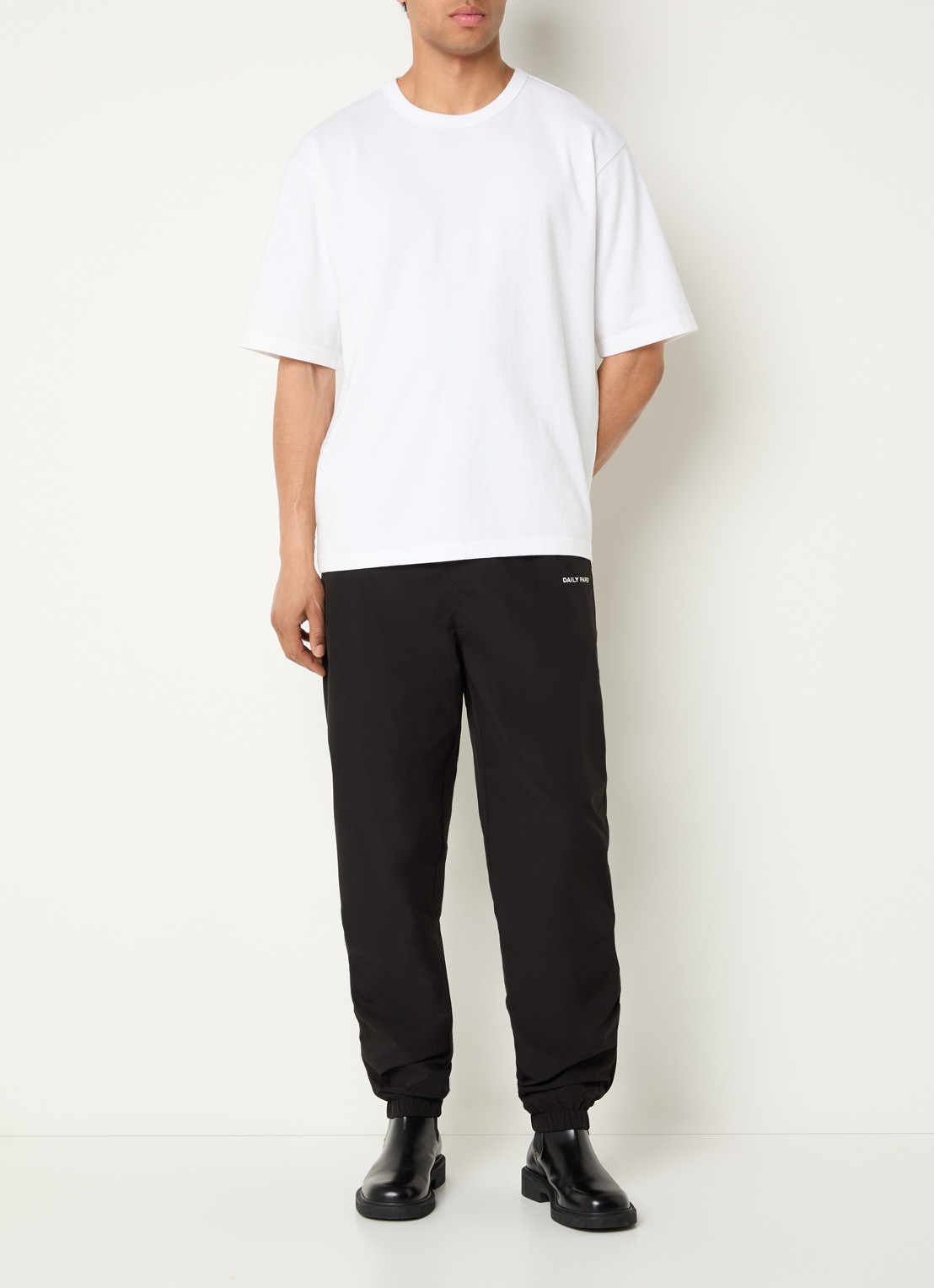 Daily Paper Eward tapered fit trackpants met logo en steekzakken - voorkant 2 zwart