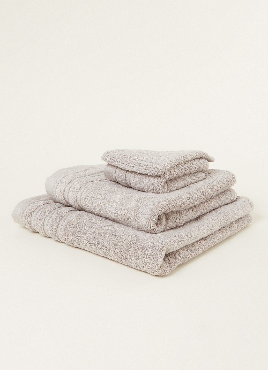 de Bijenkorf Home Evolution badhanddoek - 580 gr/m2 - 60 x 110 cm - detail lichtgrijs