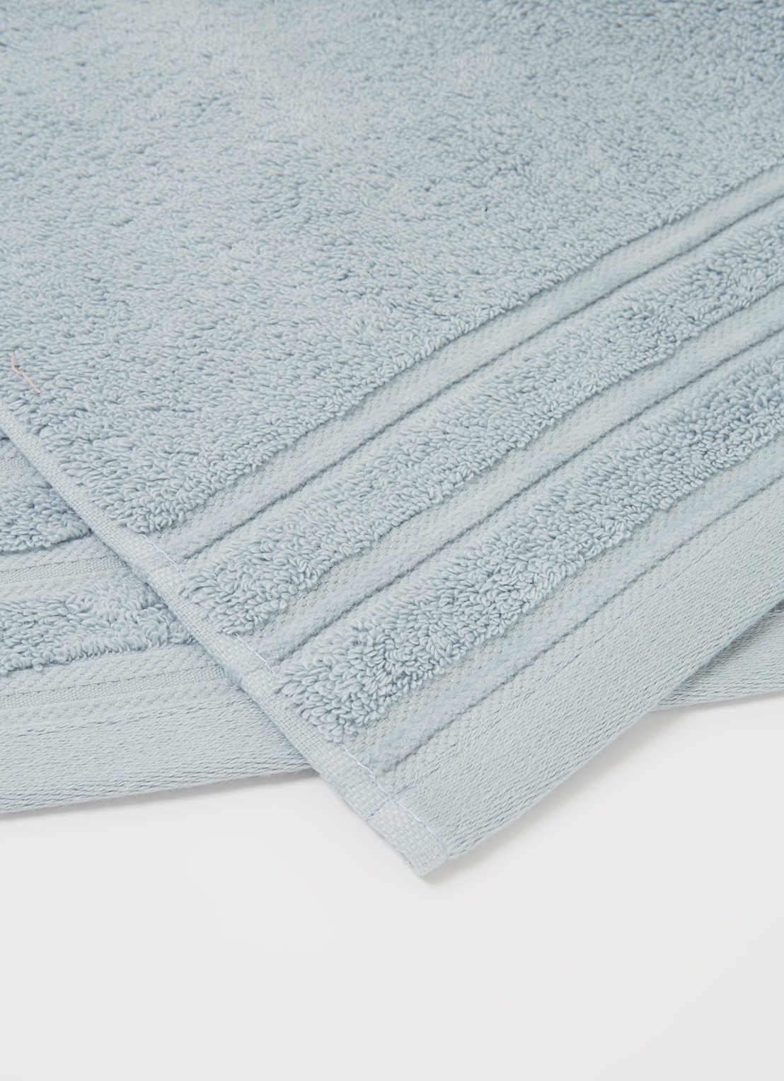 de Bijenkorf Home Evolution badhanddoek - 580 gr/m2 - 60 x 110 cm - detail 2 lichtblauw