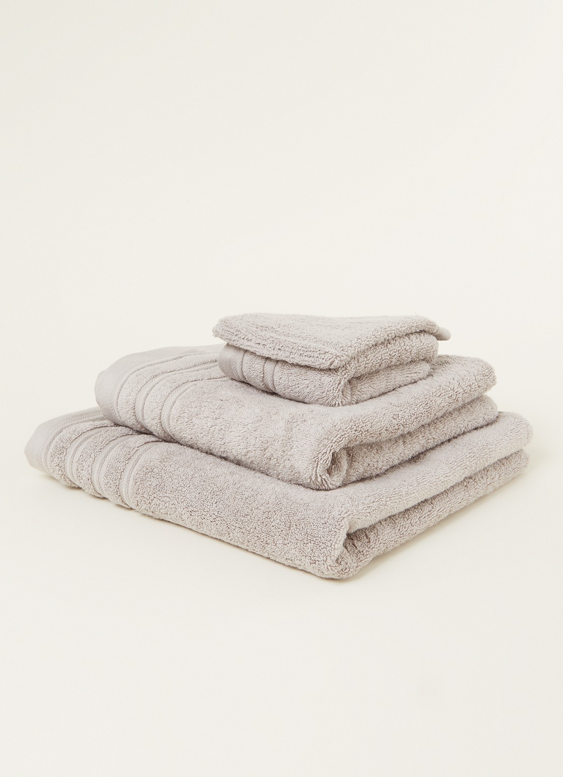 de Bijenkorf Home Evolution badlaken - 580 gr/m2 - 70 x 140 cm - voorkant 2 lichtgrijs