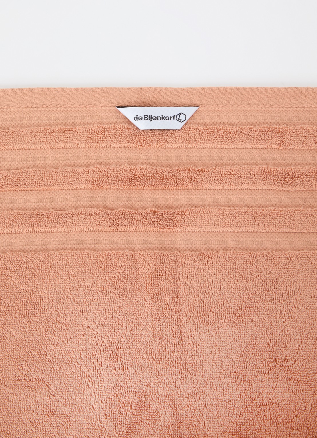 de Bijenkorf Home Evolution badlaken - 580 gr/m2 - 70 x 140 cm - detail 3 oranjebruin