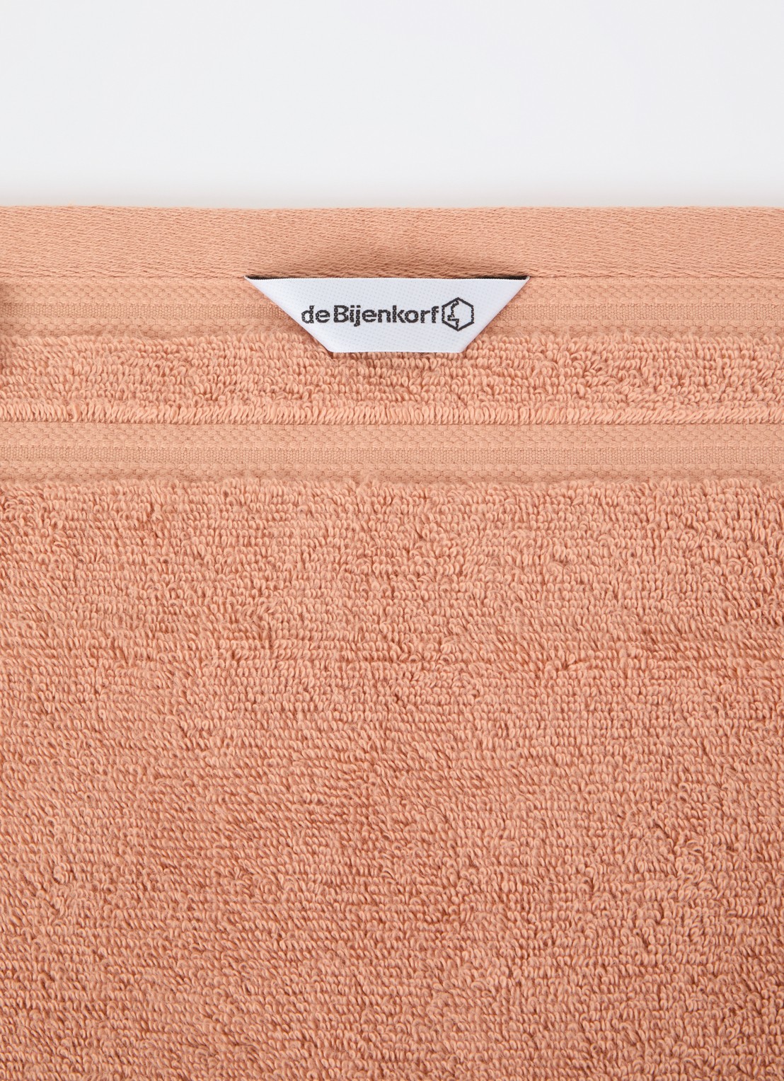 de Bijenkorf Home Evolution gastendoek - 580 gr/m2 - 30 x 50 cm - detail oranjebruin