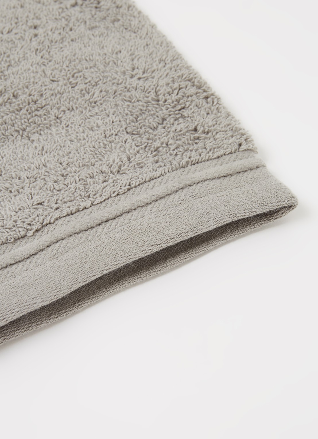 de Bijenkorf Home Evolution washand- 580 gr/m2 - 16 x 21 cm set van 2 - detail 3 lichtgroen