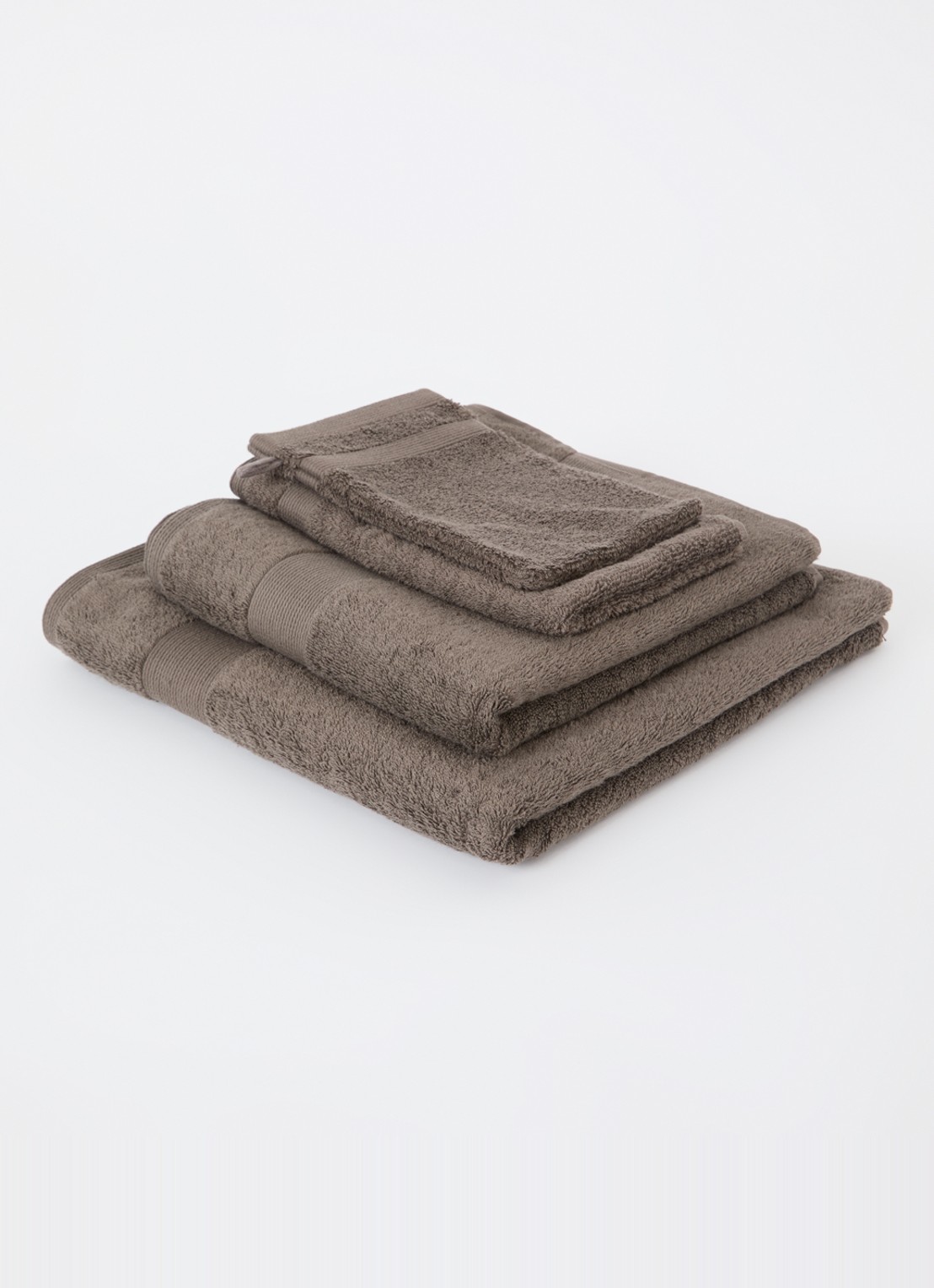 de Bijenkorf Home  Softness washand - 600 gr/m2 - 16 x 21 cm set van 2 - voorkant 2 bruin