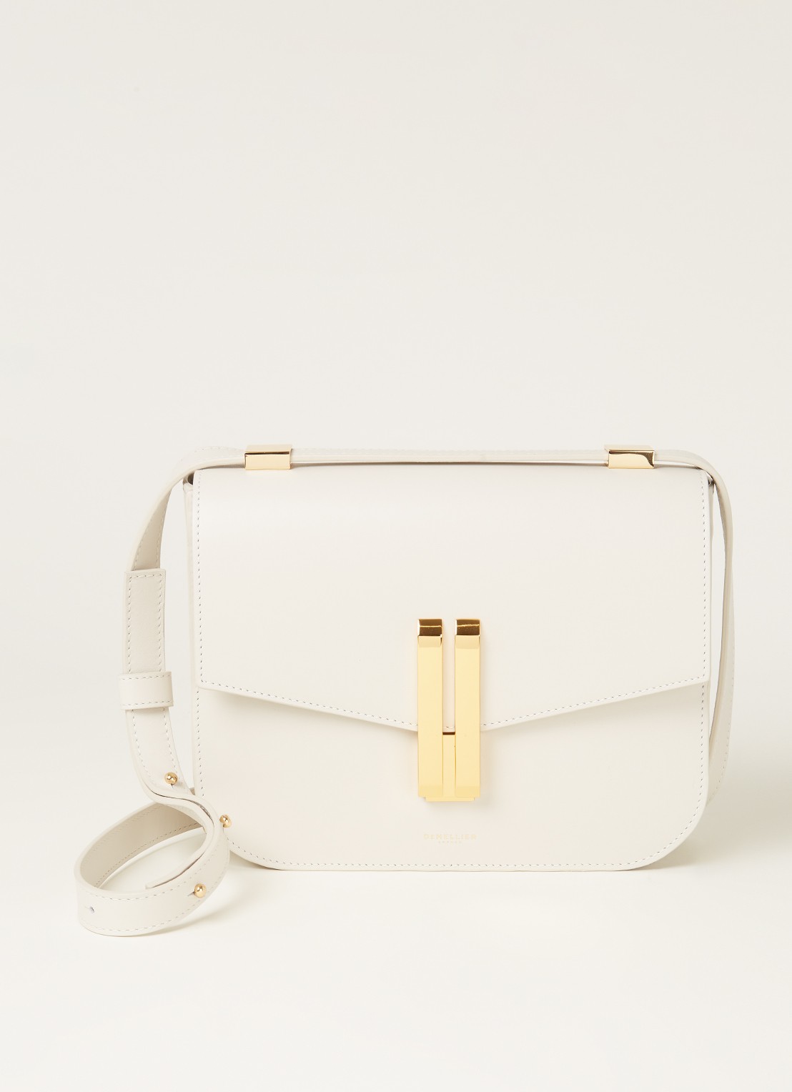 DeMellier The Vancouver crossbodytas van leer - voorkant gebroken wit