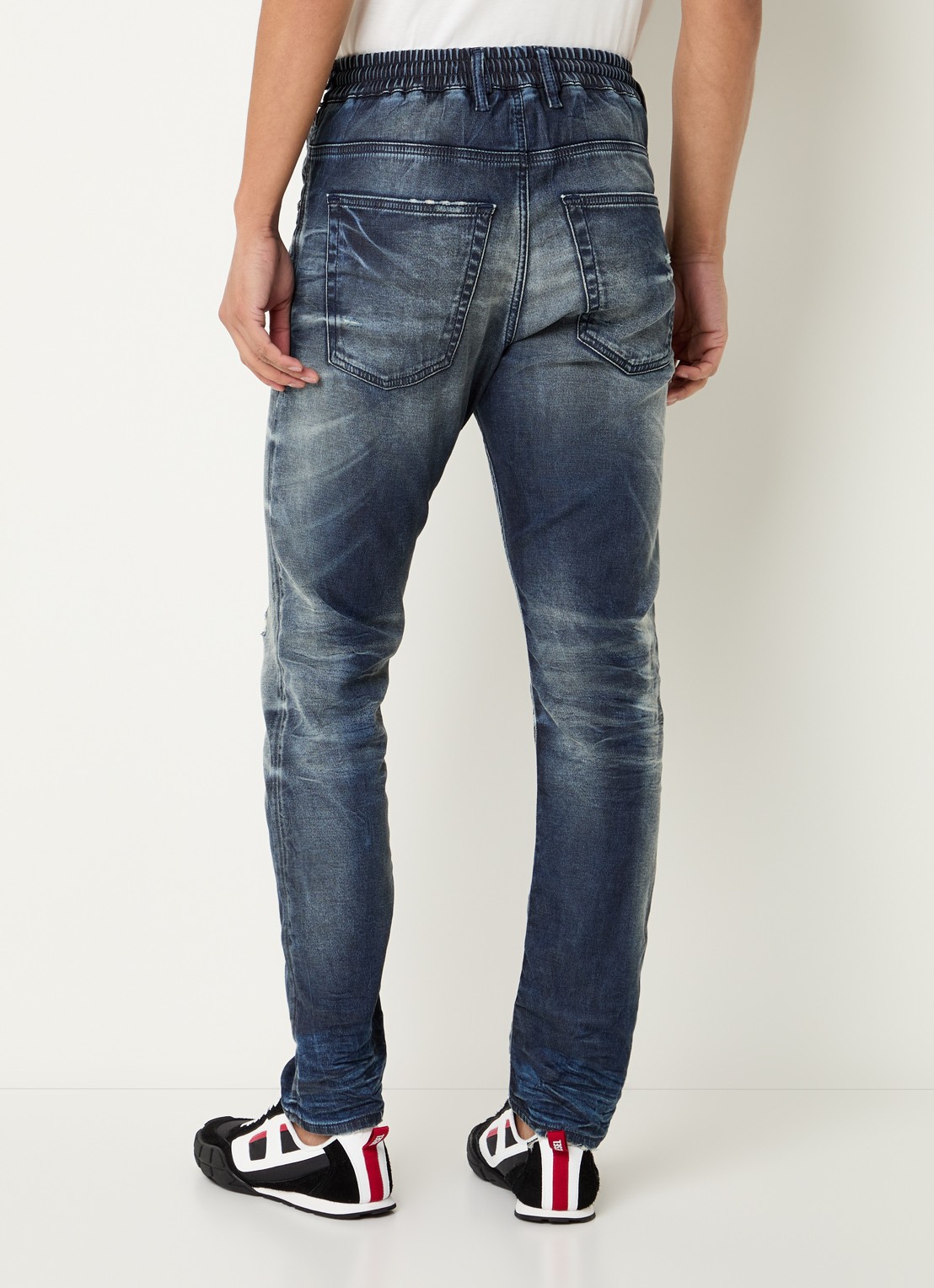 Diesel 2032 D-Krooley Joggjeans® slim fit jeans met destroyed afwerking - achterkant 5 indigo