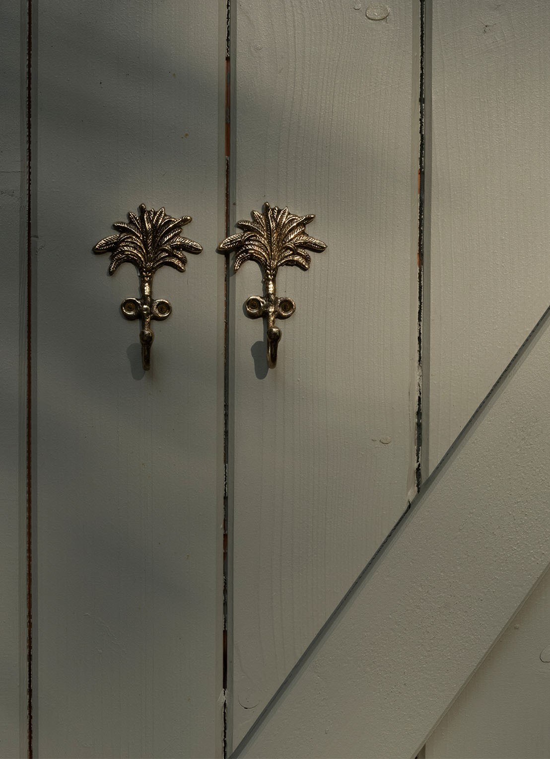 Doing Goods Marlin Palm wandhaak 7,5 cm set van 2 - voorkant 2 goud