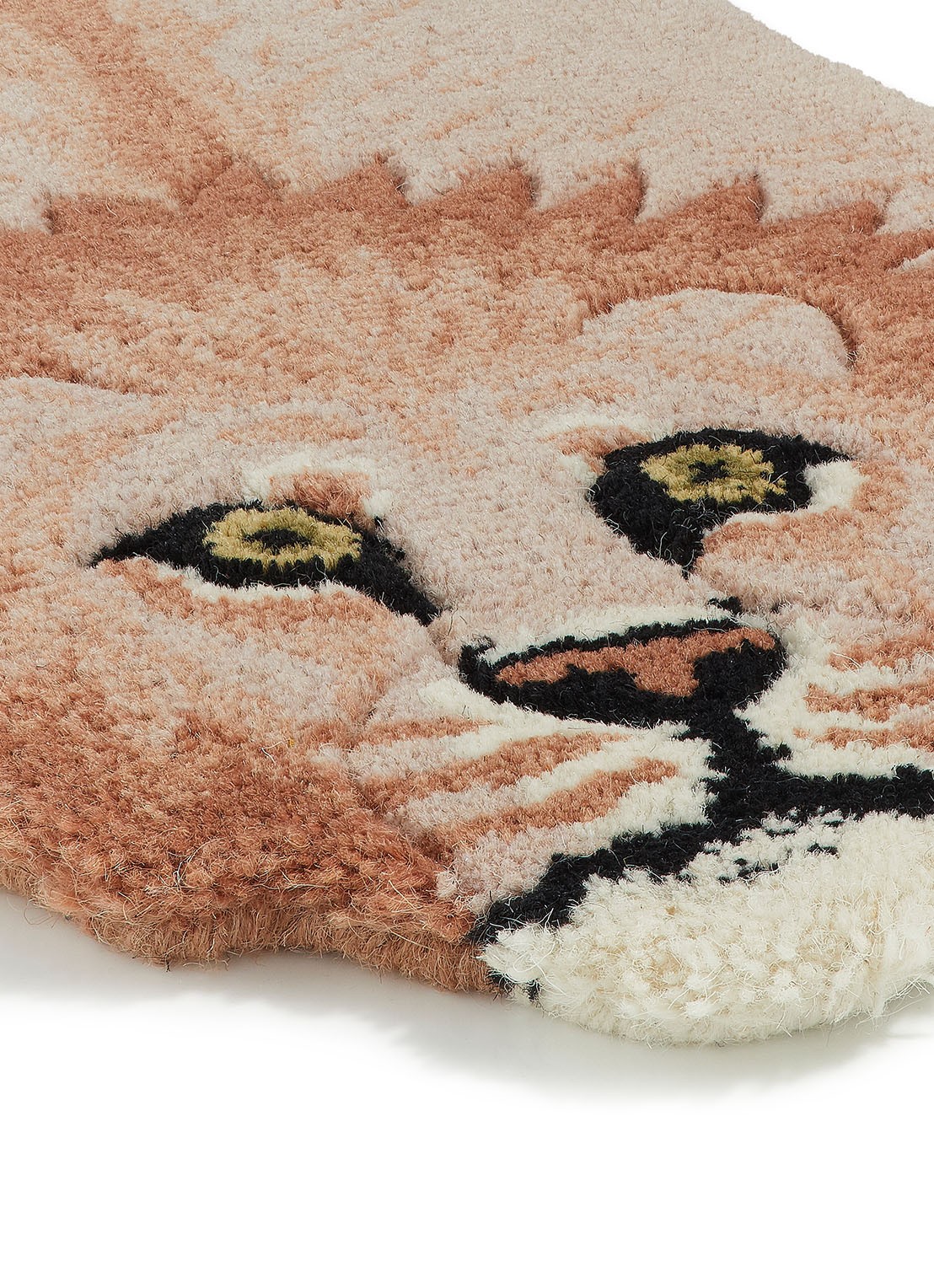 Doing Goods Pinky Lion vloerkleed 100 x 65 cm - achterkant bruin