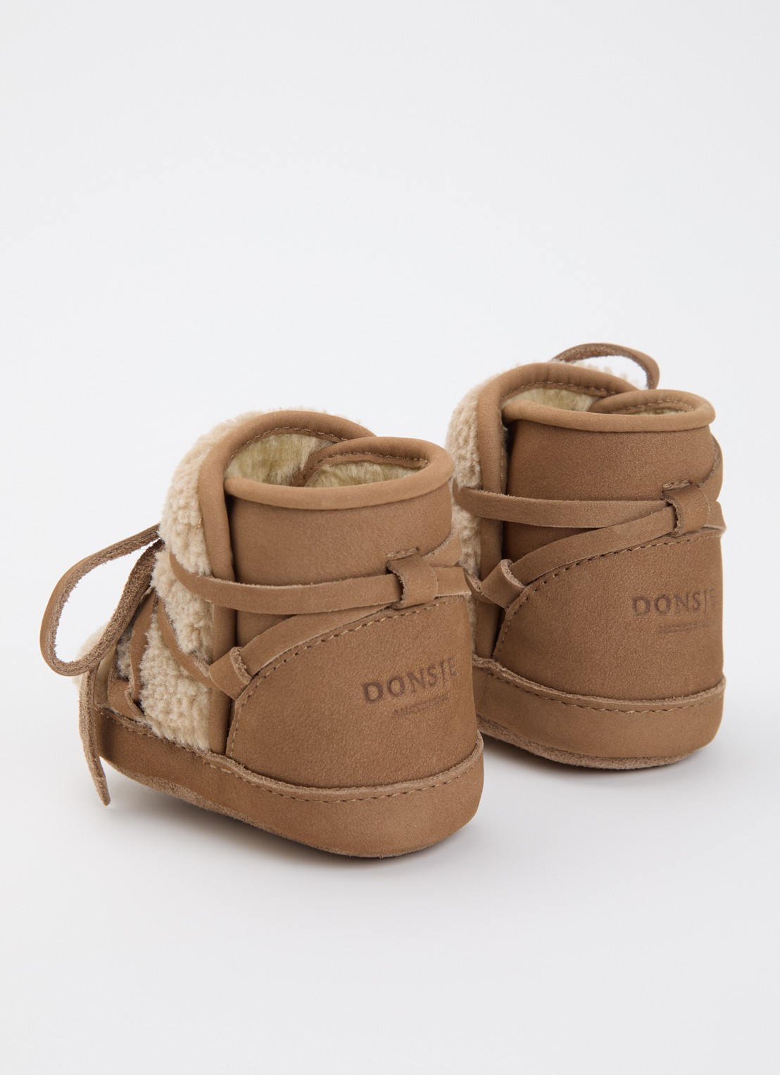 Donsje Amsterdam Inuk babyschoentje van leer - achterkant cognac