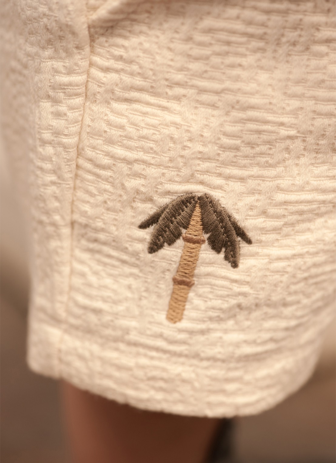 Donsje Amsterdam Ithri Palm Tree straight fit korte joggingbroek van katoen - voorkant 3 beige