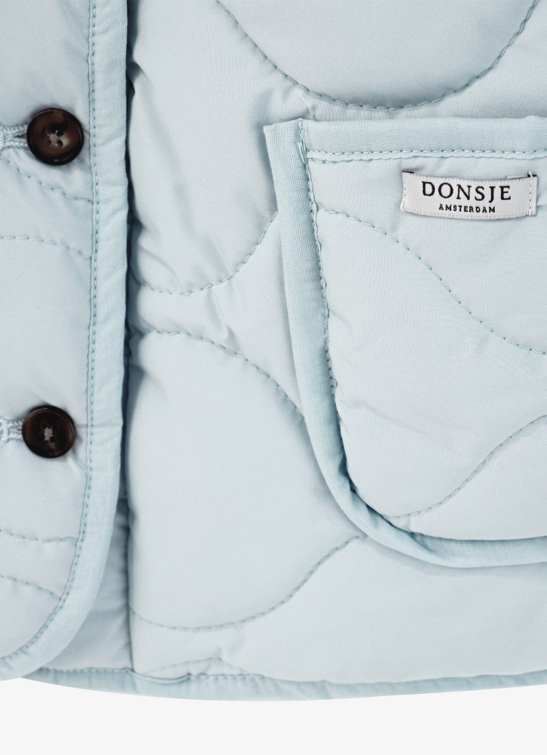 Donsje Amsterdam Tessane jas met quilt patroon - detail 2 lichtblauw
