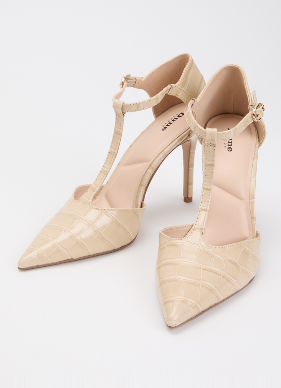Dune London Castered pump met crocostructuur  - detail zand
