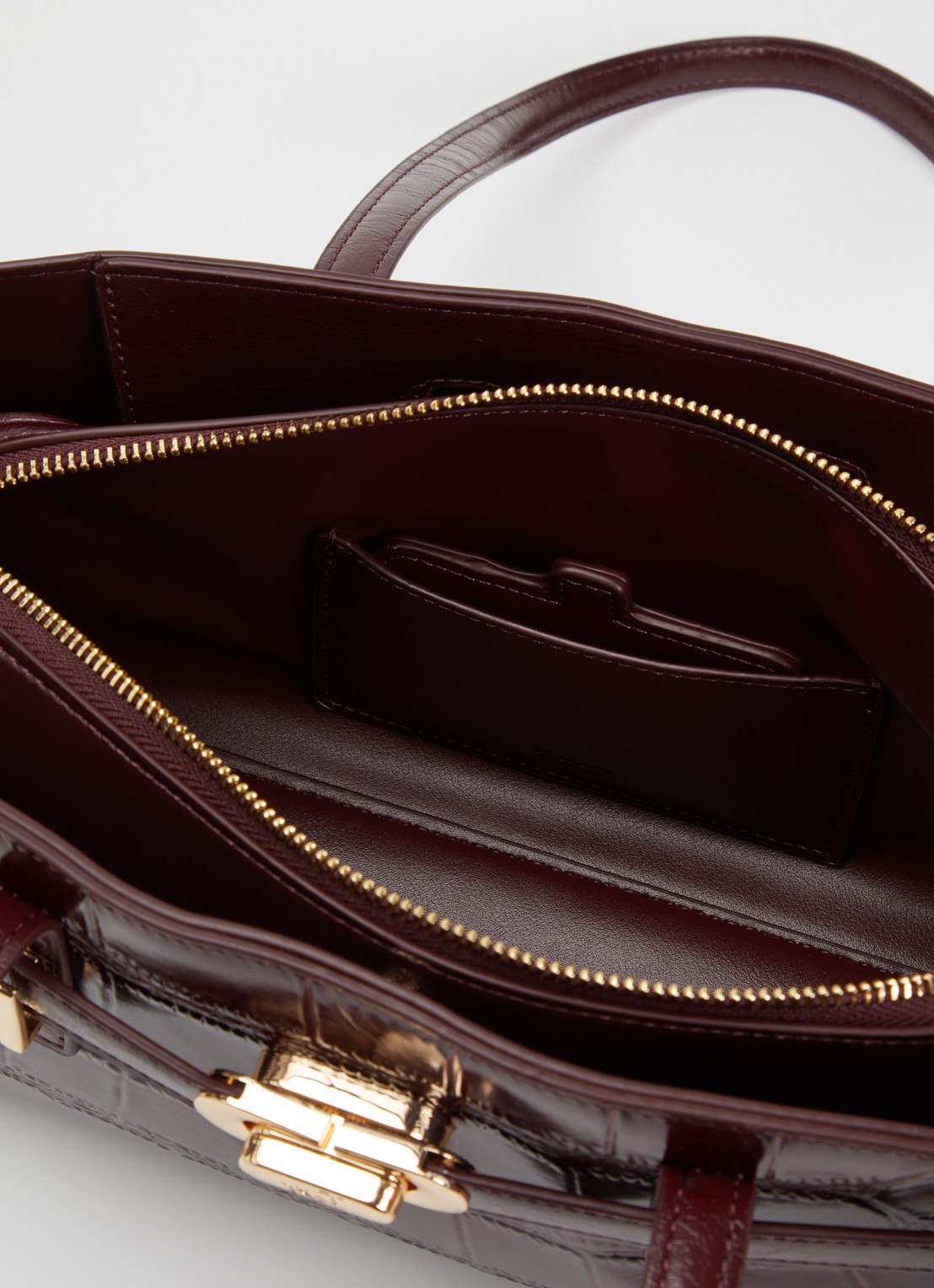 Dune London Depend schoudertas van leer met afneembare schouderriem - detail bordeauxrood