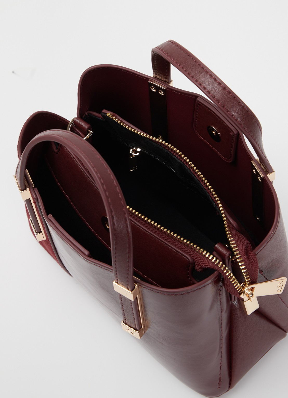 Dune London Dinkydorry handtas met afneembare schouderriem - detail bordeauxrood