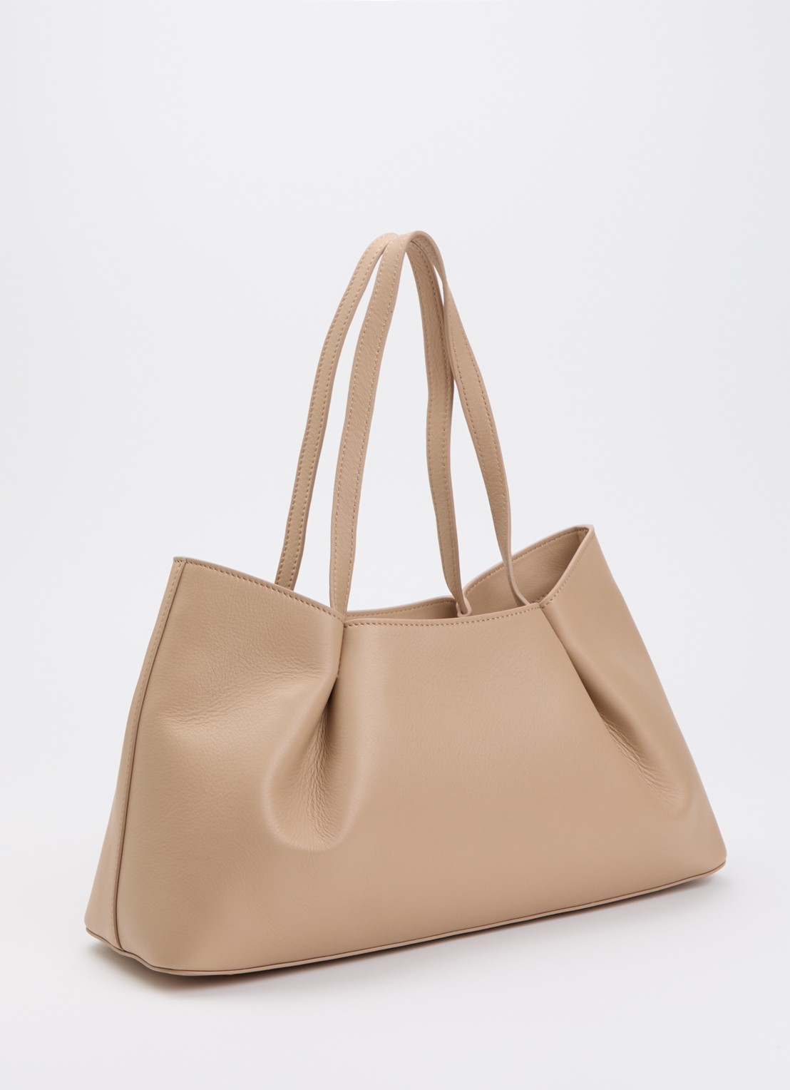 Elleme Dimple M schoudertas van leer - achterkant beige