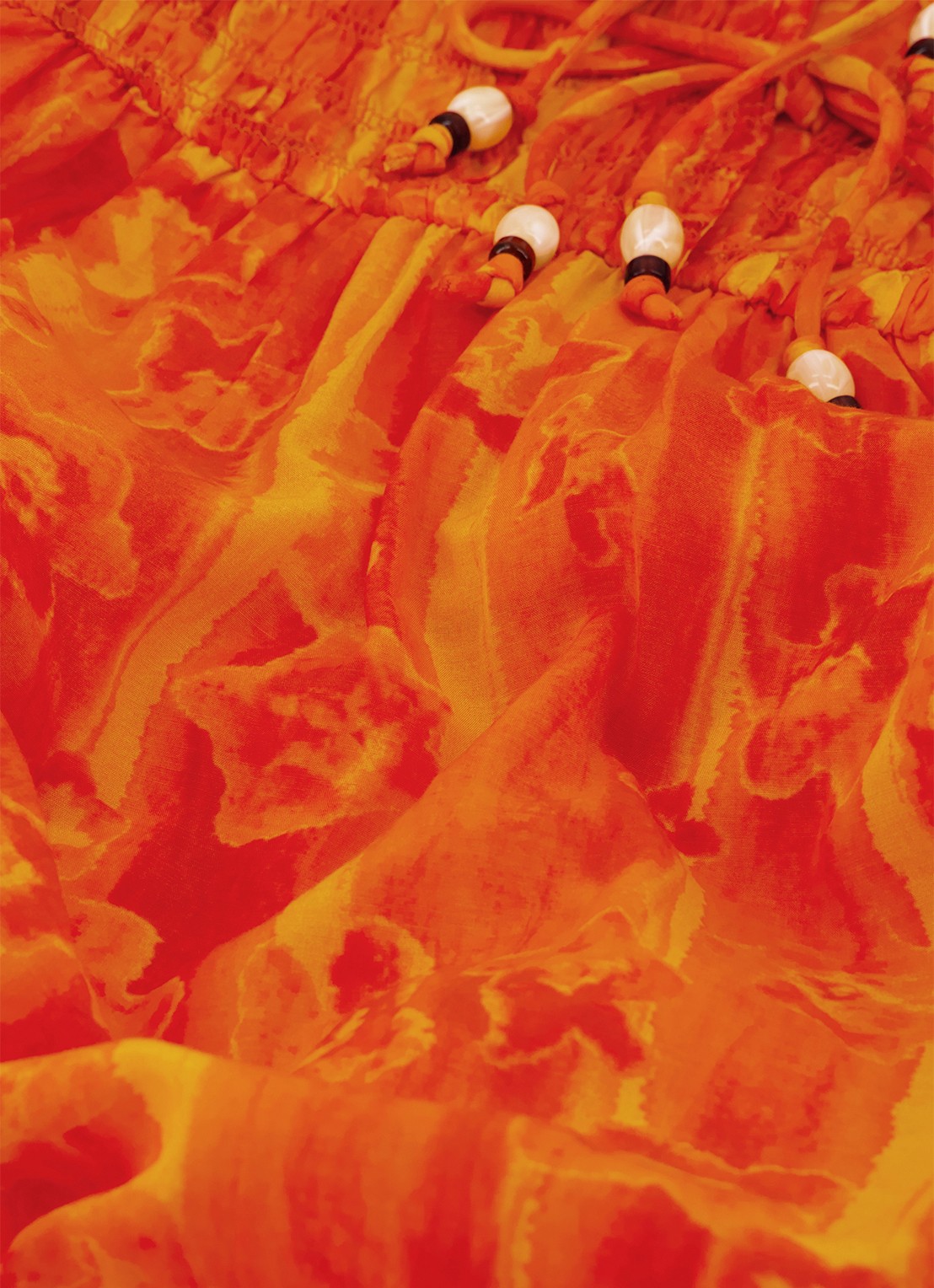 Fabienne Chapot Elou maxi jurk met smockwerk en print - detail 5 orange