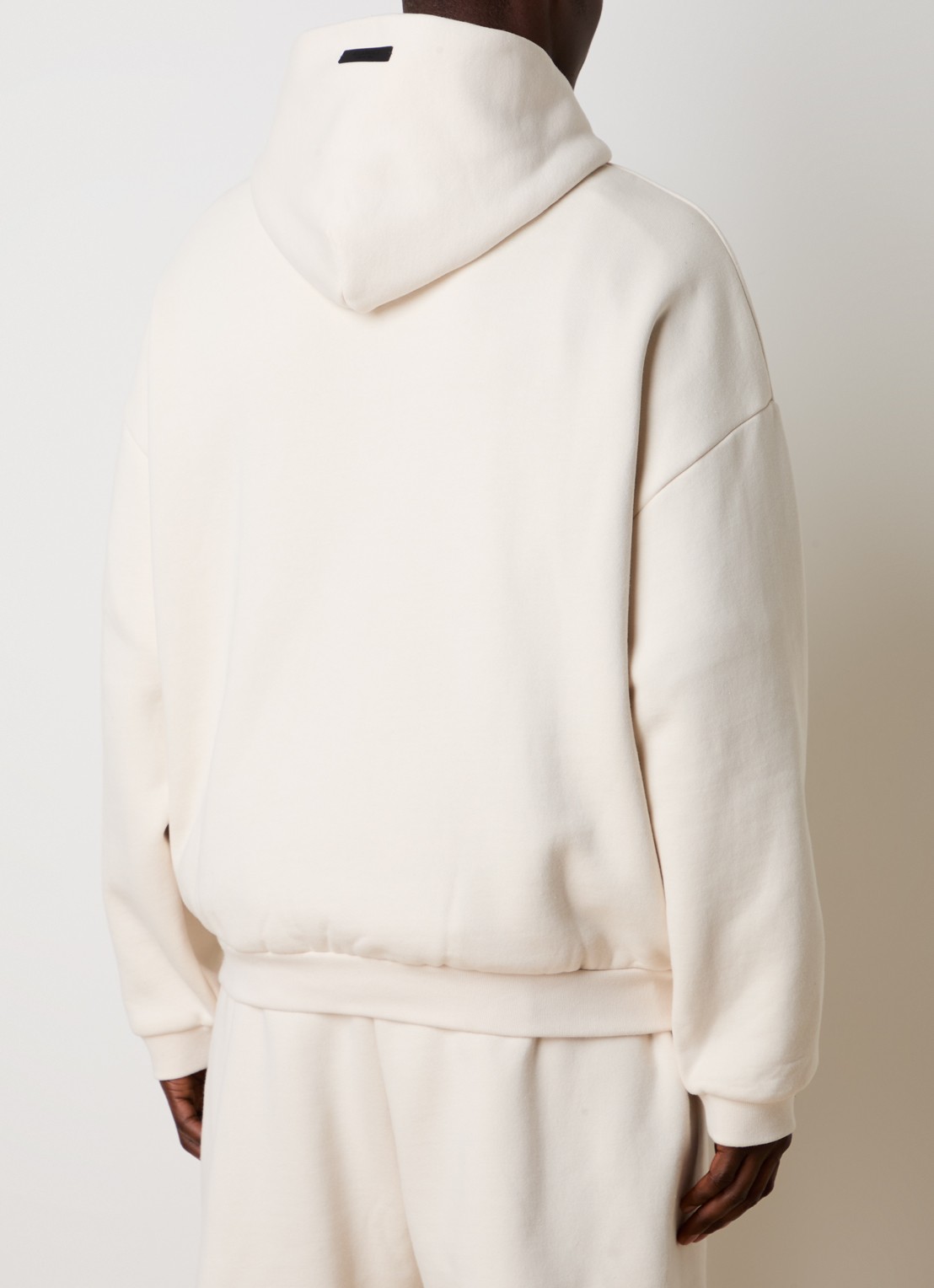 Fear of God Essentials Hoodie met logoprint - achterkant creme