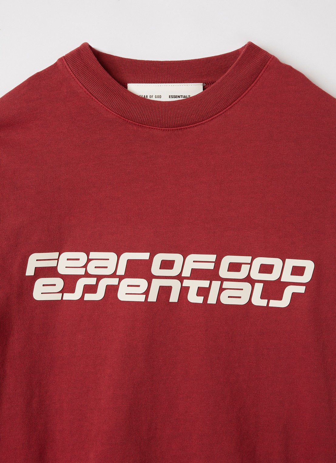 Fear of God Essentials Longsleeve met logoprint - detail steenrood