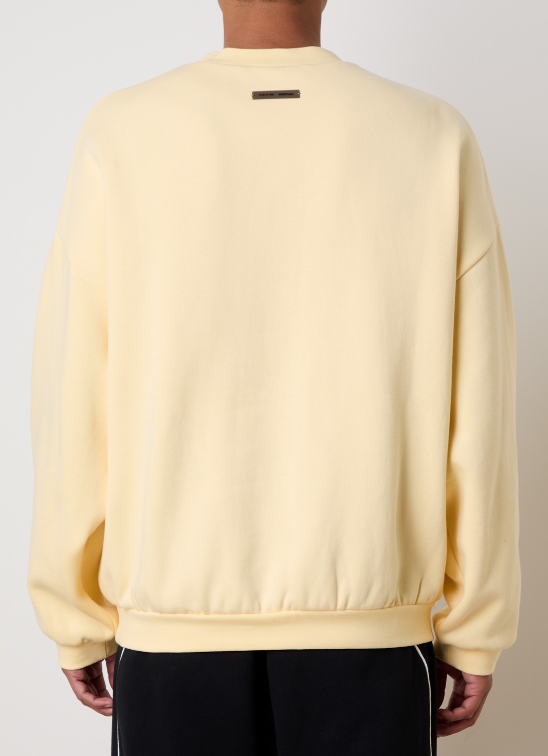 Fear of God Essentials Sweater met logoborduring - achterkant 3 lichtgeel