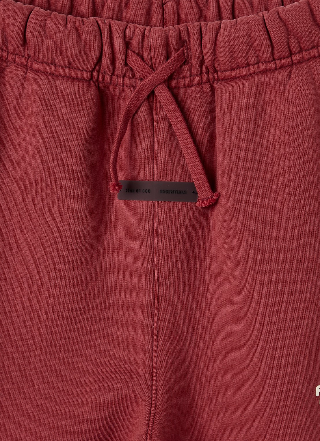 Fear of God Essentials Tapered fit joggingbroek met logo - detail steenrood