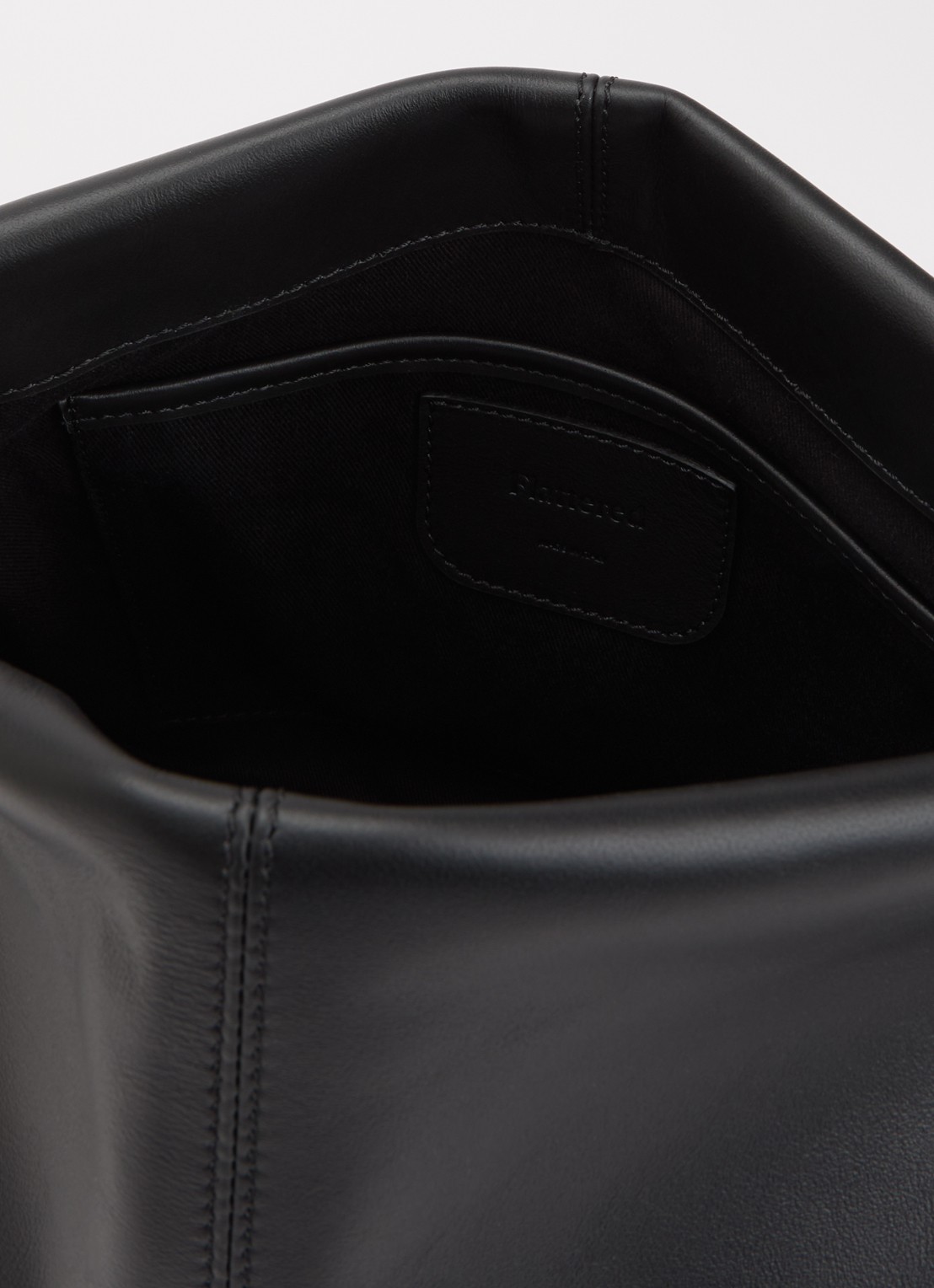 Flattered Clay clutch van leer - detail 3 zwart
