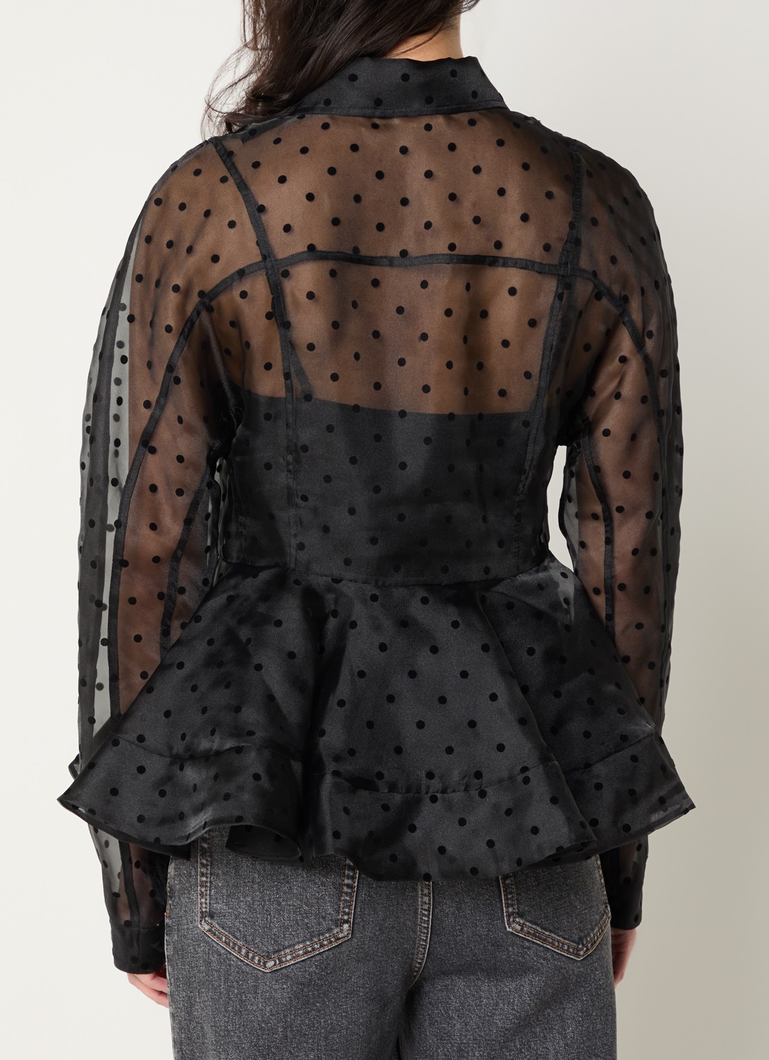 Ganni Semi-transparante blouse met stippenprint en peplum - achterkant zwart