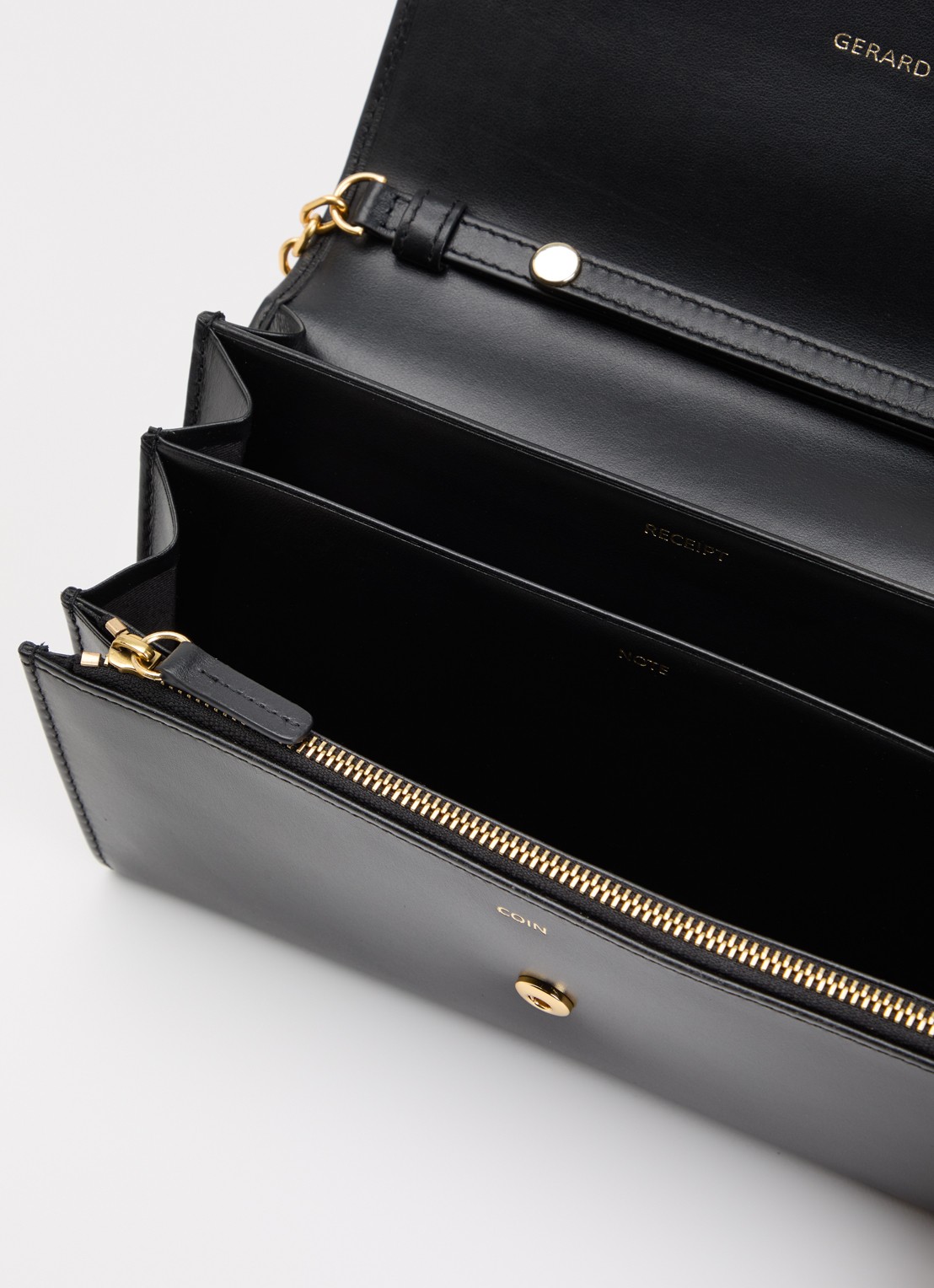 Gerard Darel Enveloppe clutch van leer met afneembare schouderriem - detail zwart