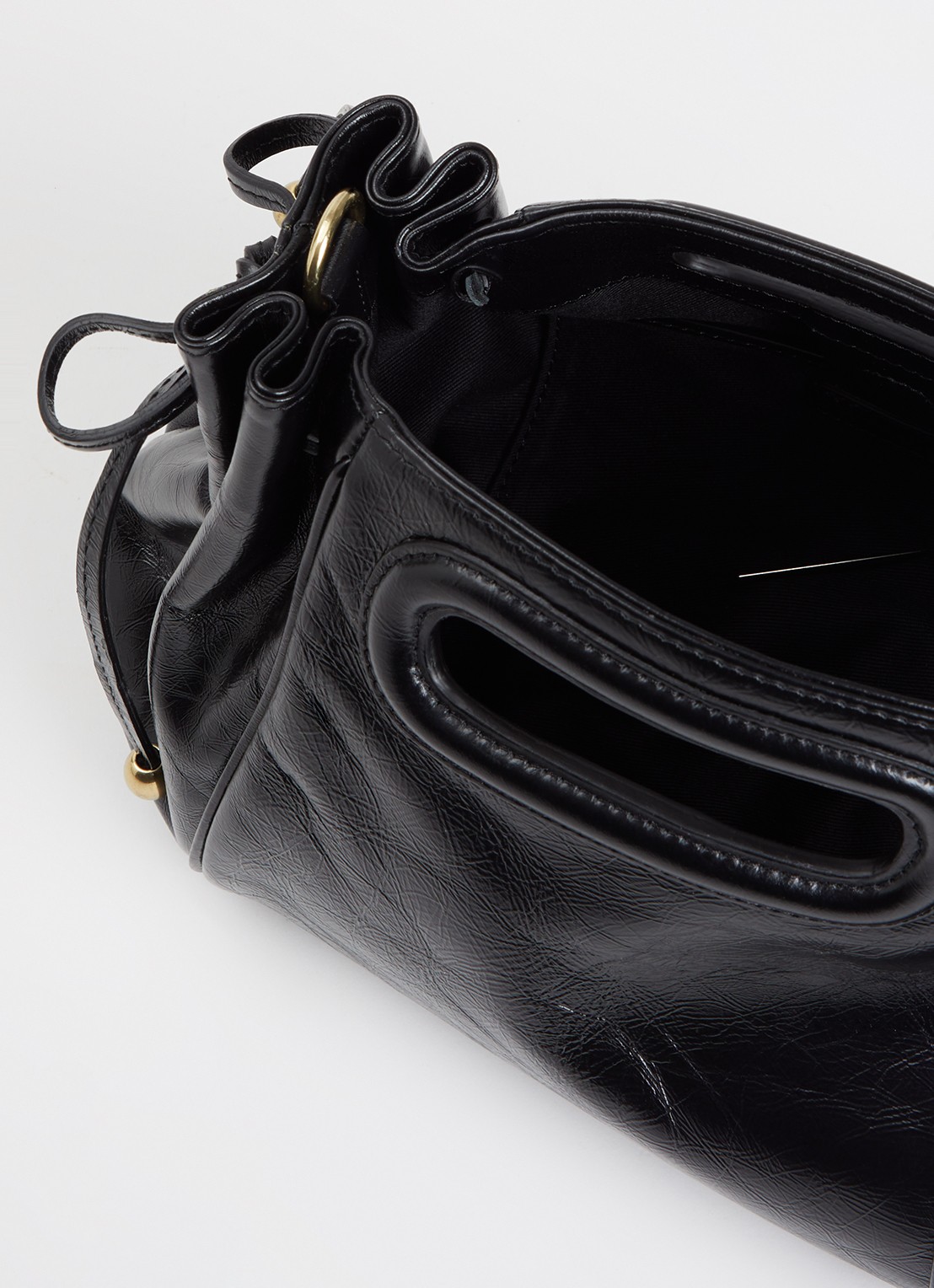 Gerard Darel Mini Dany handtas van leer met afneembare schouderriem - detail zwart