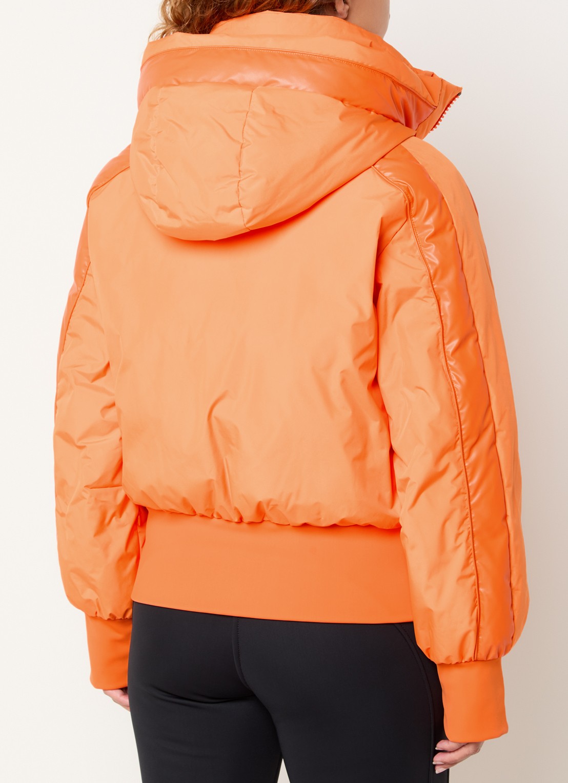Goldbergh Volare ski-jas met capuchon en ritszakken - achterkant orange
