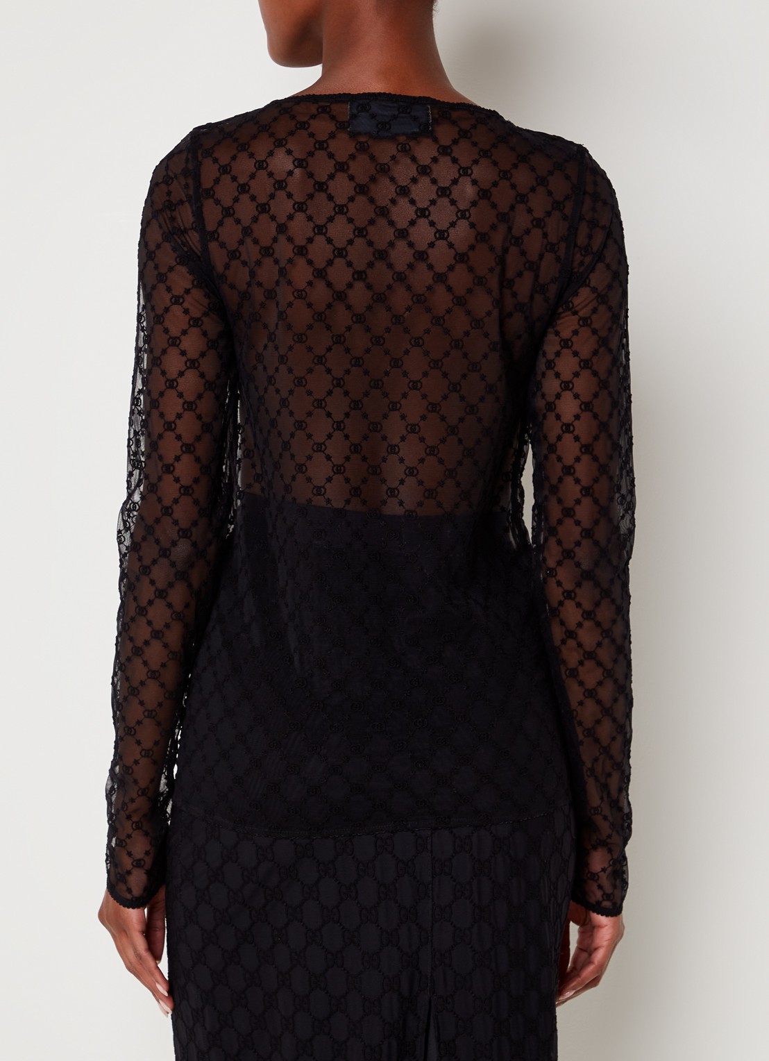 Gucci Semi-transparante top van mesh met logoprint - achterkant zwart