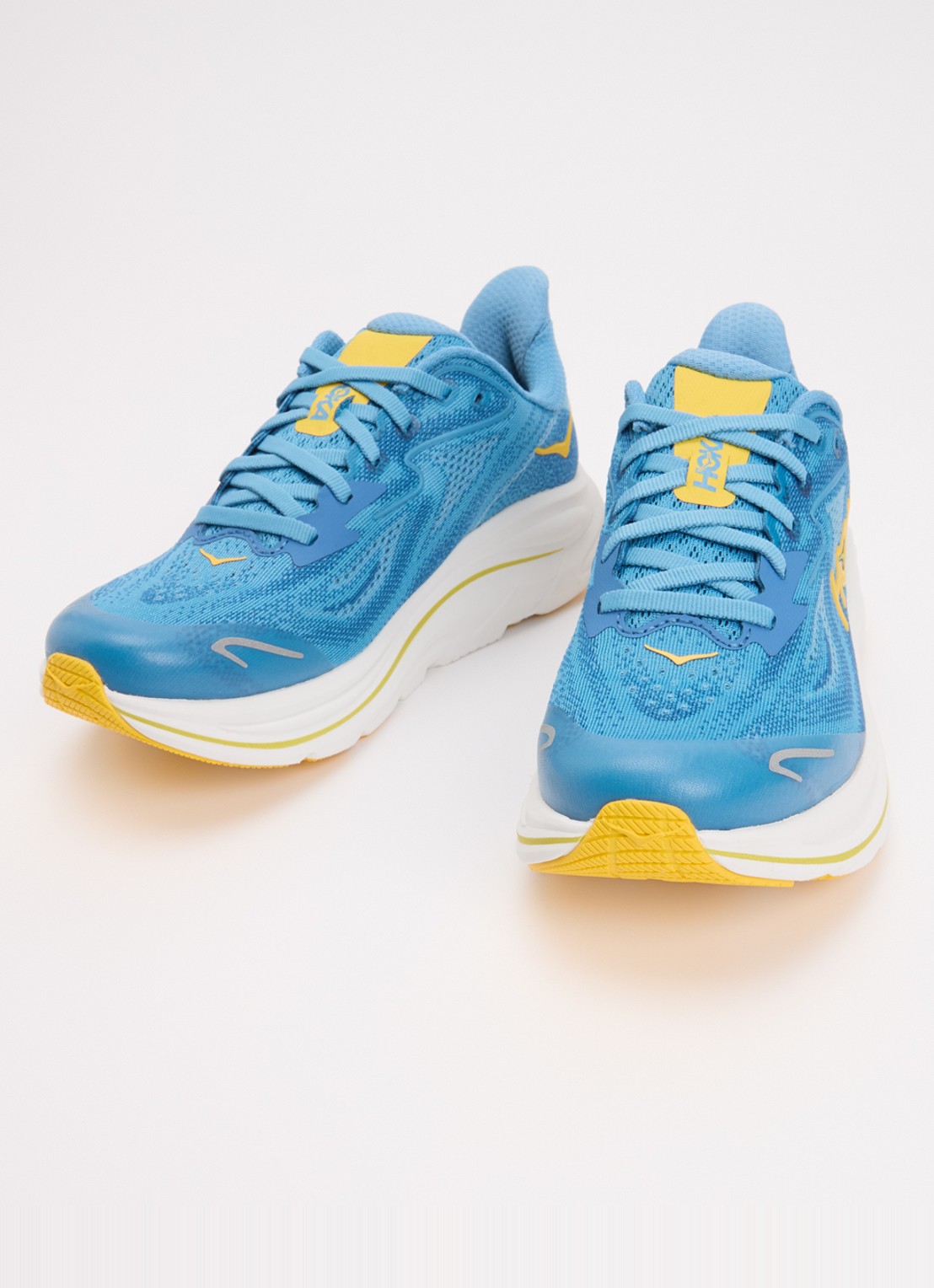 HOKA Clifton 10 hardloopschoen met gebreid bovenwerk en logo - detail 2 donkerblauw