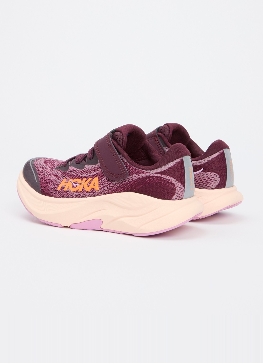 HOKA Rincon 4 hardloopschoen met gebreid bovenwerk en logo - achterkant fuchsia
