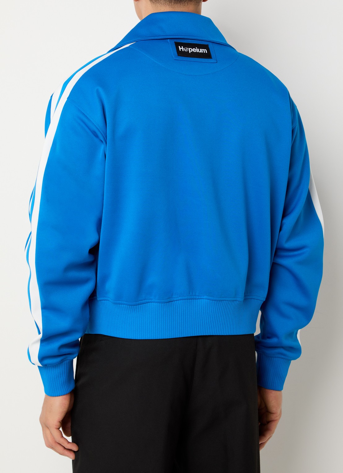 Hopeium Trackvest met ritszakken en logo - achterkant blauw