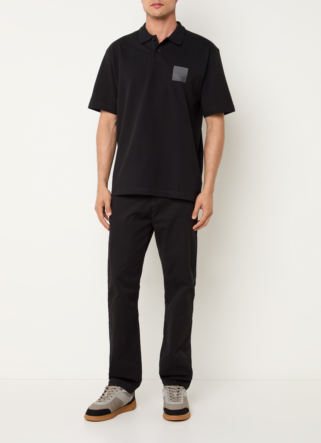 HUGO Dusplity regular fit polo van piqué katoen met logo - voorkant 2 zwart