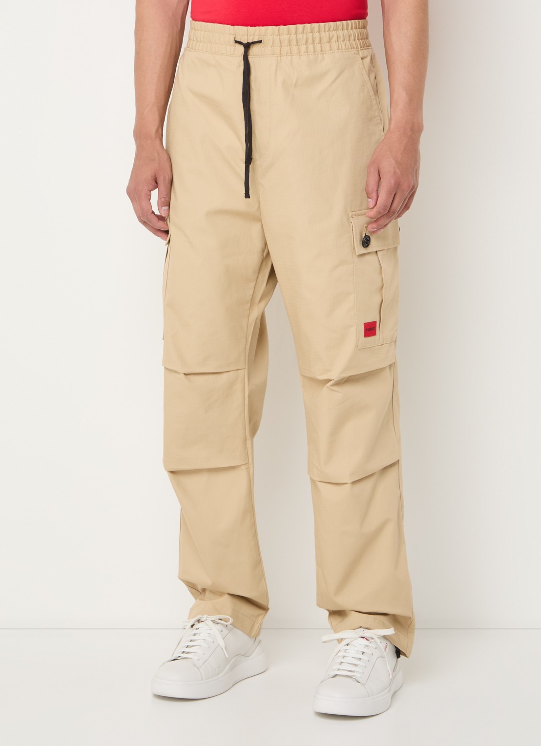 HUGO Garlo233 tapered fit cargobroek met logo - detail beige