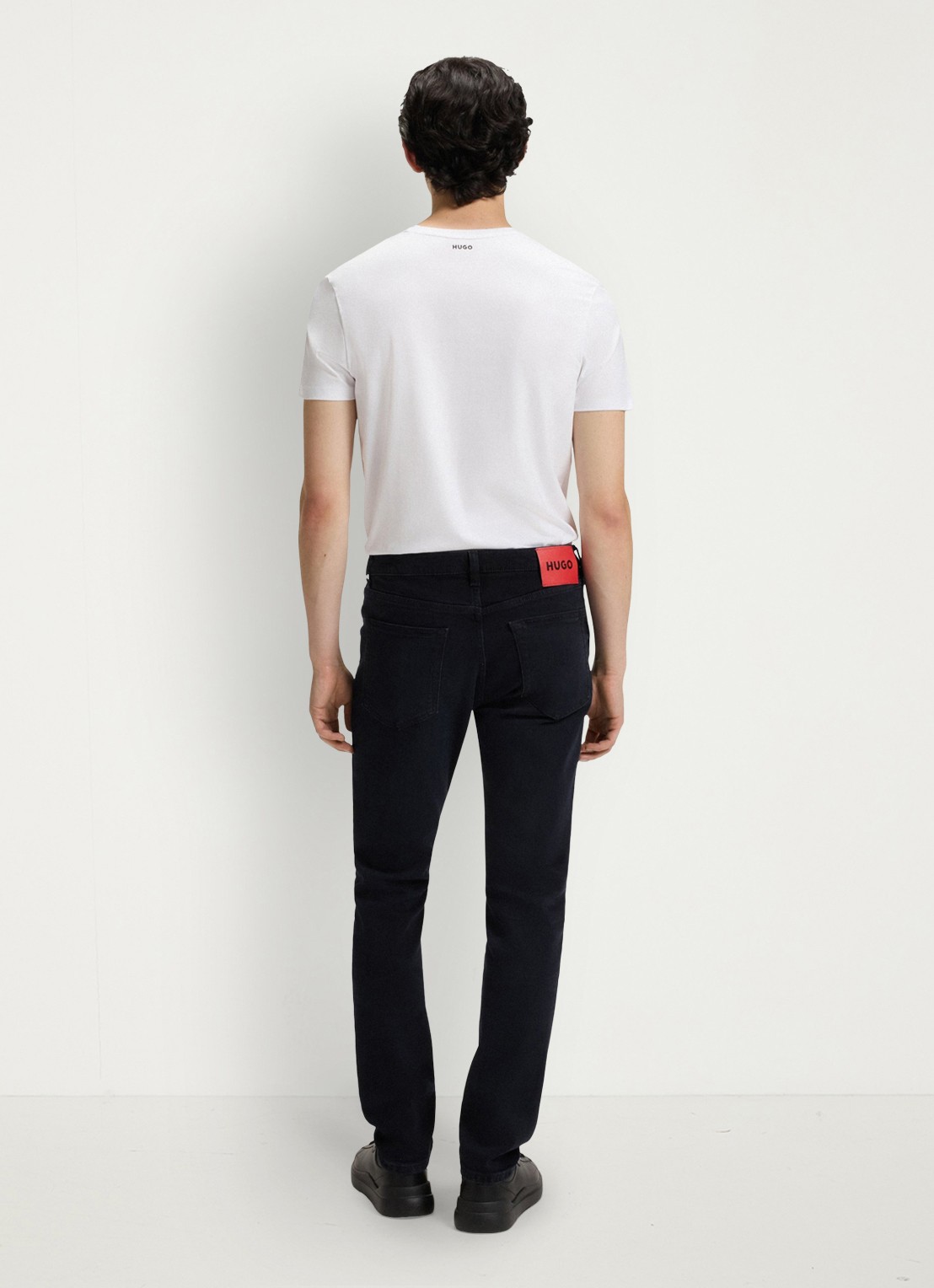 HUGO Slim fit jeans met donkere wassing - achterkant indigo