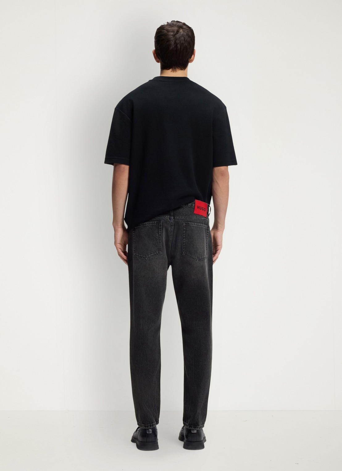 HUGO Slim fit jeans met gekleurde wassing - achterkant 4 zwart