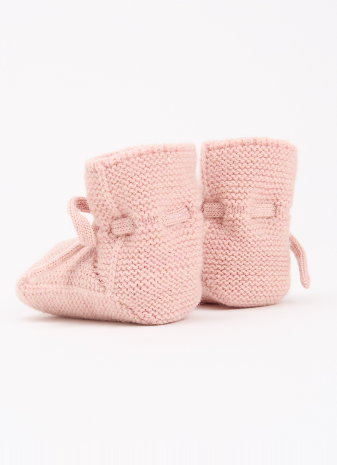 Hvid Babyslofjes van merino wol - achterkant zalmroze