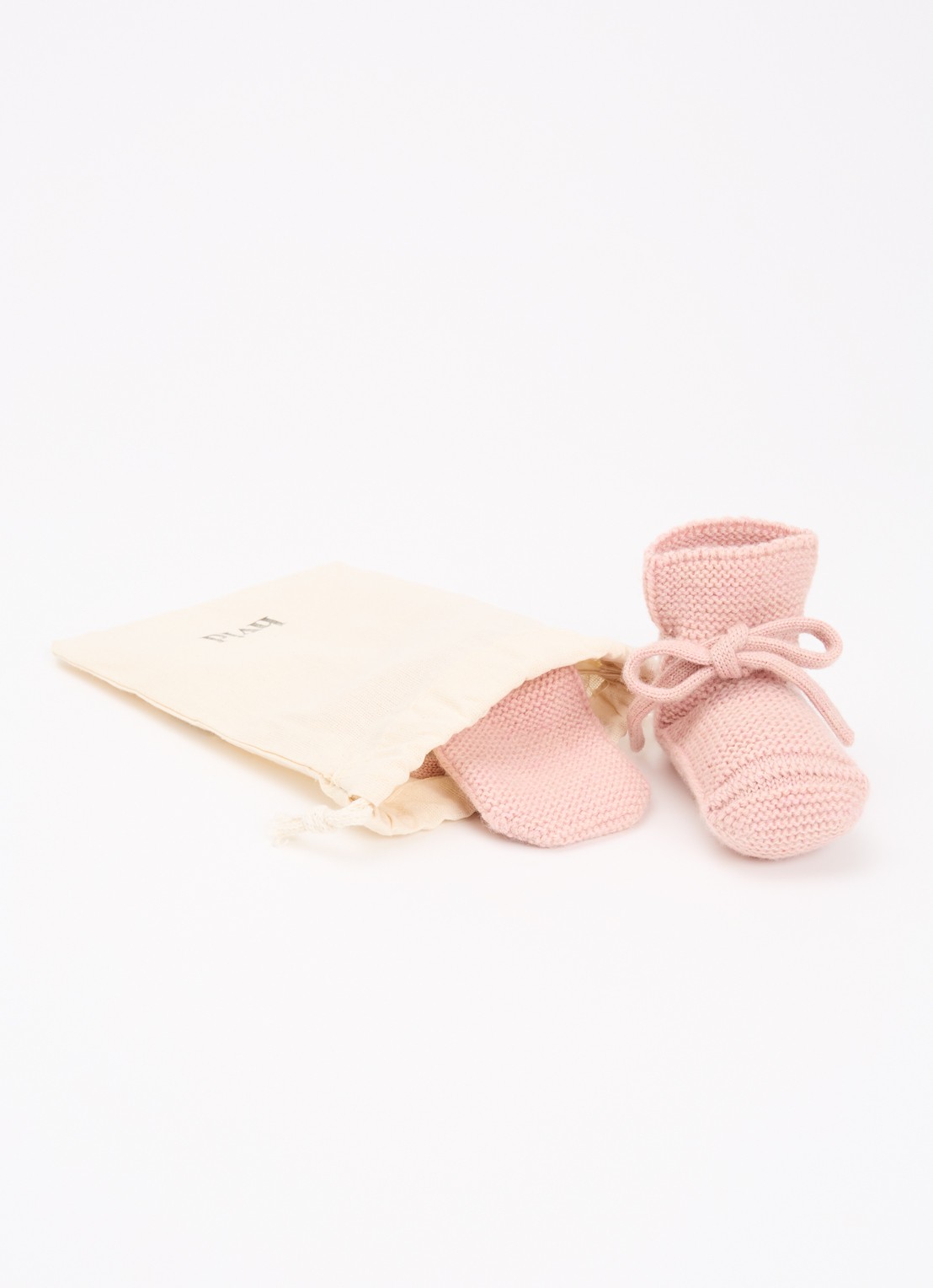Hvid Babyslofjes van merino wol - detail 3 zalmroze