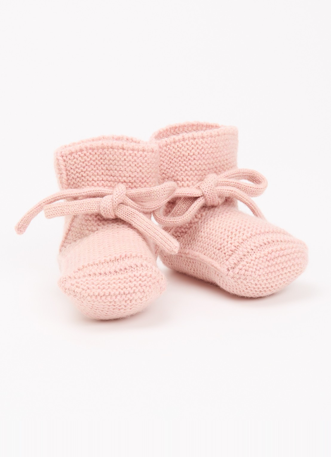 Hvid Babyslofjes van merino wol - voorkant 2 zalmroze