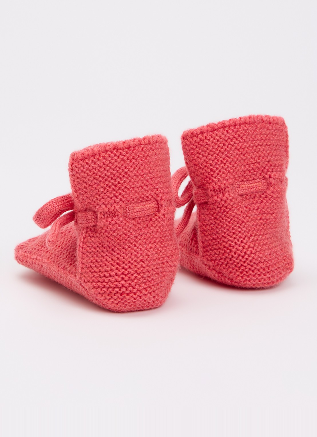 Hvid Babyslofjes van merino wol - achterkant 4 donkerroze