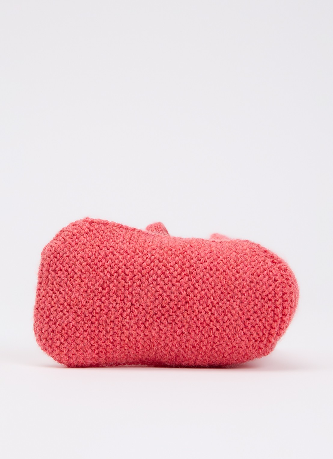 Hvid Babyslofjes van merino wol - detail donkerroze