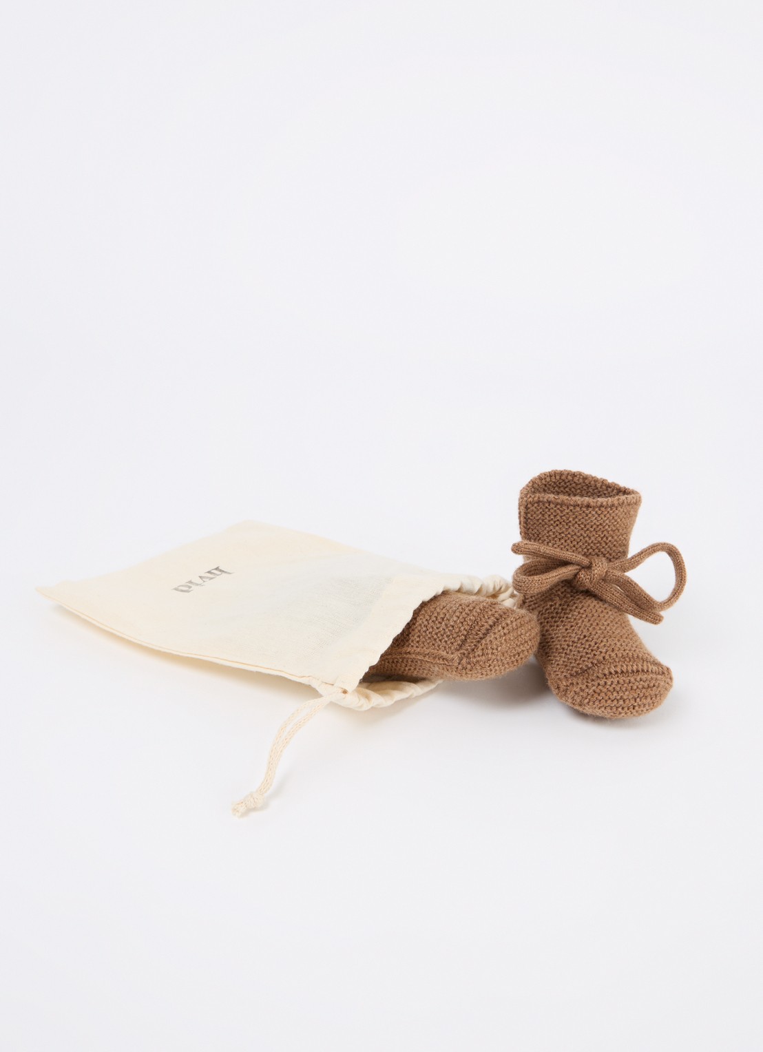 Hvid Babyslofjes van merino wol - detail 2 bruin